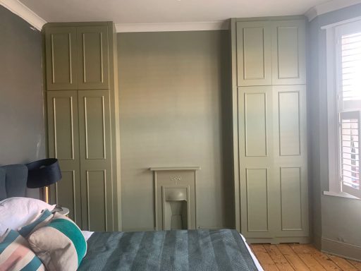 Pair of panelled wardrobes
