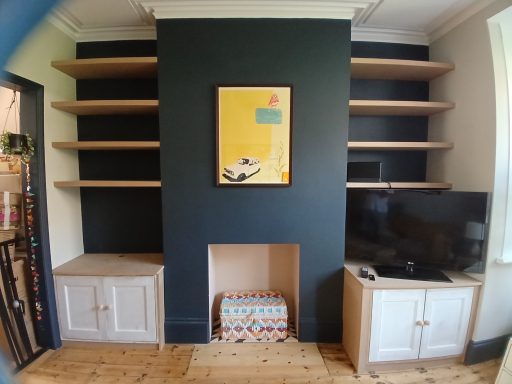 Shaker cupboards and floating shelves
